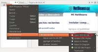 Conjunto de menús contextuales de un proyecto NetBeans para seleccionar la opción de abrir el SDE para NetBeans de Visual Paradigm. En el menú principal aparece resaltada la opción Herramientas, de la que surge otro menú contextual con la opción SDE EE-NB resaltada, del que a su vez surge otro menú con la opción OpenSDE NB-EE resaltada.