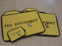 Documento. Fotografía en la que se muestra una carpeta de color amarillo que pone My Document.