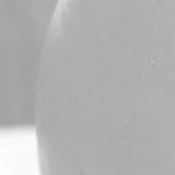 Imagen que muestra una parte de una manzana vista de cerca considerada como la imagen modificada