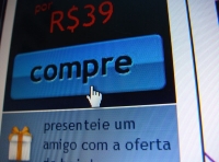 Compre. Se muestra un botón dentro de una página web con la leyenda “compre” y el puntero sobre él.