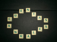 La imagen muestra, con letras de un juego de  palabras cruzadas, el título del punto cuatro del tema, cuentas anuales. Las letras son cuadradas color crema y letra en verde y el fondo es un tapiz negro.