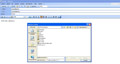 Captura de pantalla de Outlook Express  que muestra cómo enviar un correo electrónico con archivo adjunto.