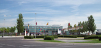 Feria internacional. Aparece una imagen del exterior del salón de ferias de Madrid.