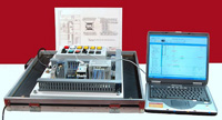 Imagen de automatismo con PLC, PC para programación  y cable de comunicación.