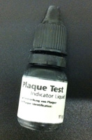 La imagen muestra un bote de Plaque Test.