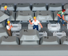 Fotomontaje con una serie de operarios en pequeña escala  trabajando para reparar un teclado de ordenador enorme