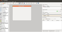 Imagen que muestra una captura de pantalla de la herramienta QT Designer con sus menús, y paneles a izquierda y derecha del lienzo, formado por un formulario en blanco preparado para ser diseñado.